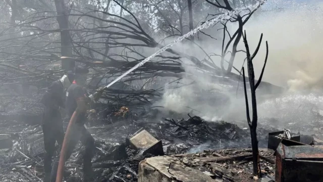 Rescuers work at the site of an airplane that crashed in India's northwestern city of Ahmedabad in Gujarat state, June 12, 2025. Photo: UNB/AP
